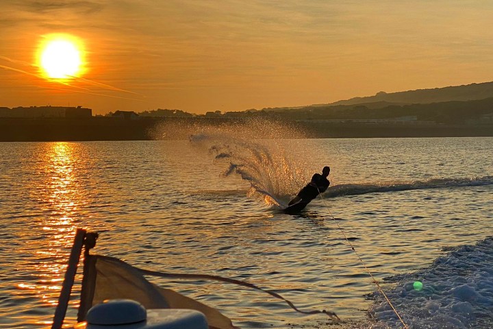 a sunset over a body of water